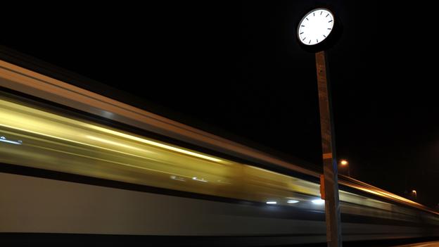 Train moving fast at night