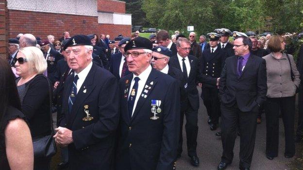 Mourners at funeral