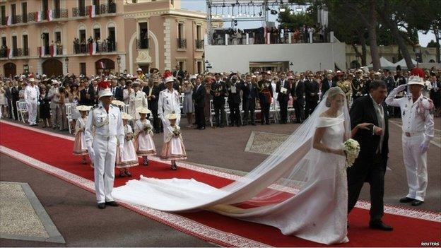 Prince Albert and Princess Charlene marrying in 2011