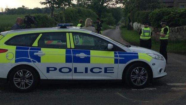 Police car near scene of the incident