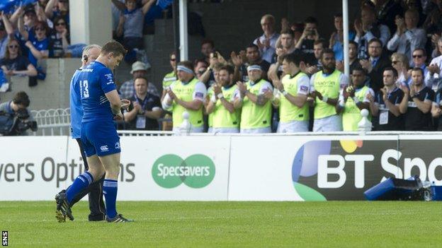 Irish legend Brian O'Driscoll makes his way off the field after picking up an early injury in his last match