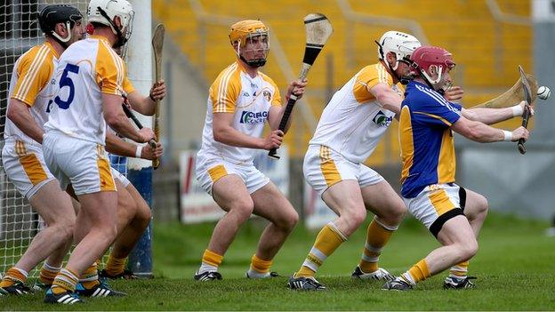 Antrim goalkeeper Chris O'Connell saves a Wexford free