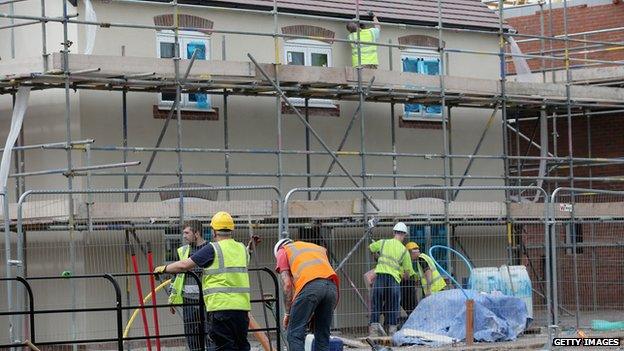 Builders working on a housing development