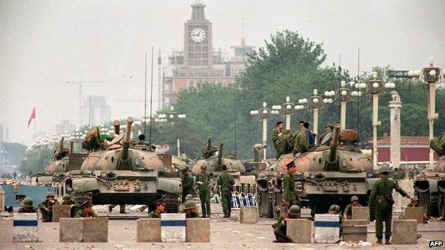 The People's Liberation Army tanks guard a strategic Chang'an Avenue leading to Tiananmen Square on 6 June 1989