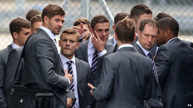 The comedian appeared to be spotted first by captain Steven Gerrard before security and local police intervened