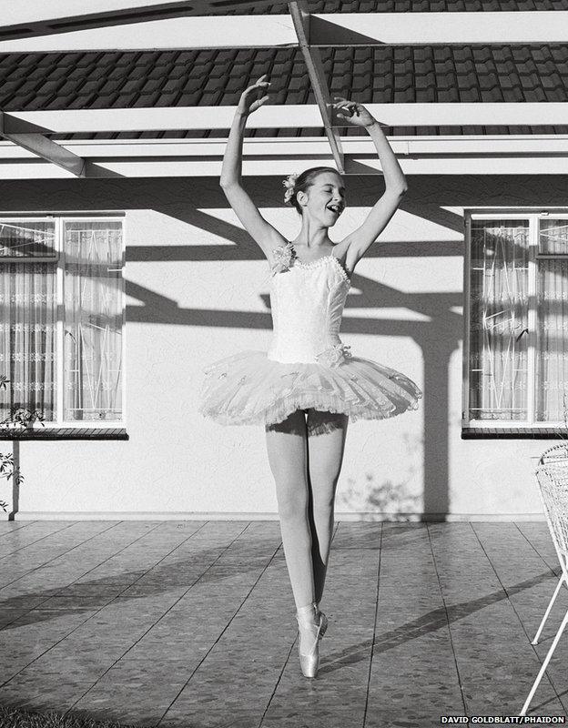 Girl in her tutu on the stoep, 1980 by David Goldblatt