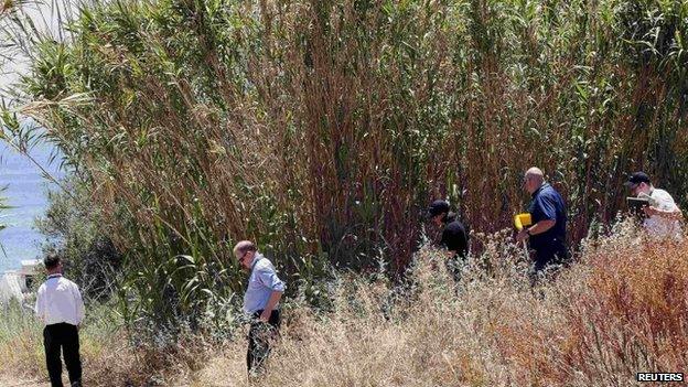 Police searching an area of Praia da Luz