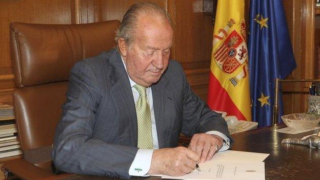 King Juan Carlos signs his abdication