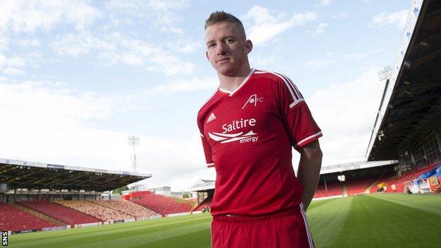 Aberdeen's Johnny Hayes models the new strip