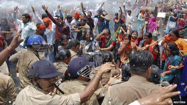 Protesters demonstrate outside the office of Uttar Pradesh's chief minister, demanding an end to attacks on women, Lucknow, India, 2 June 2014