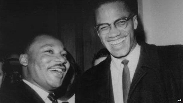 Martin Luther King (Left) and Malcolm X, head of a new group known as Muslim Mosque, Inc., smile for photographers March 26th 1964