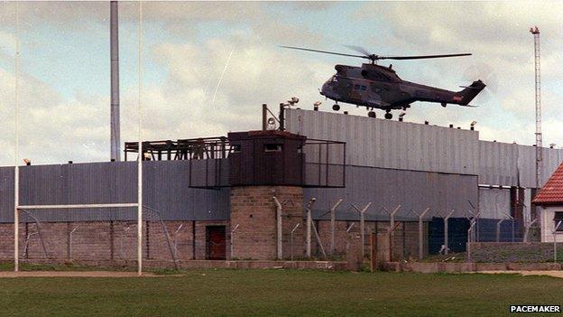 A helicopter lands in the Army base beside Crossmaglen Rangers' GAA pitch