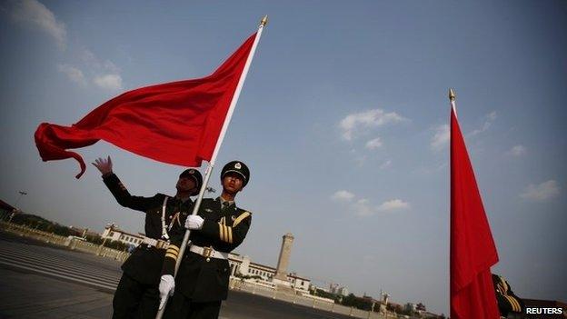 Chinese honour guards in front of the Monument to the People's Heroes at Tiananmen Square in Beijing, 3 June 2014