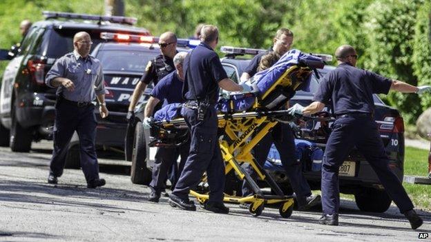 An unnamed stabbing victim is treated by authorities in Waukesha, Wisconsin, on 31 May 2014