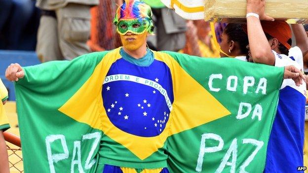 A Brazilian supporter gestures before a friendly football match between Brazil and Panama on 3 June 2014