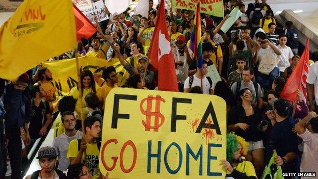 Activists from the World Cup Popular Committee group protest against the Fifa World Cup in front of Mane Garrincha National Stadium in Brasilia on 30 May 2014.