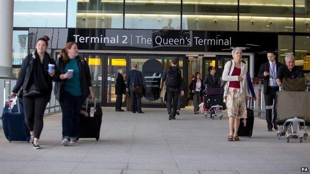 Passengers arrive at the new Terminal 2