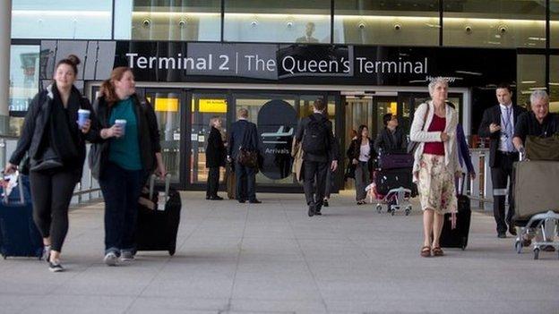 Passengers arrive at the new Terminal 2