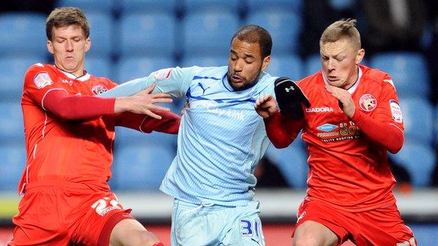 Walsall centre-half Paul Downing and midfielder Sam Mantom