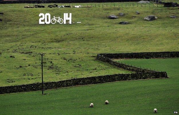 2014 sign in a field near Keighley