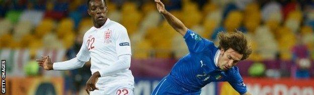 England's Danny Welbeck and Andrea Pirlo of Italy