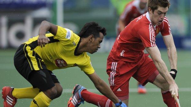 England's Henry Weir in action against Malaysia