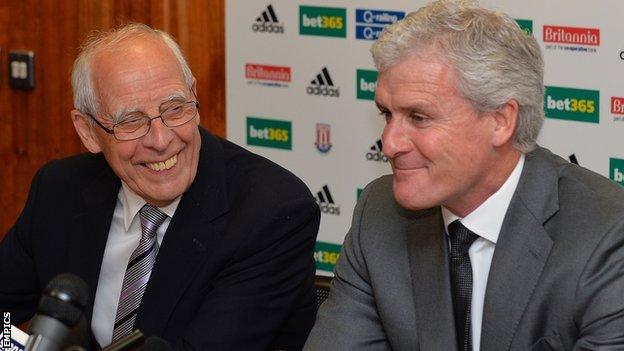 Stoke City chairman Peter Coates and manager Mark Hughes