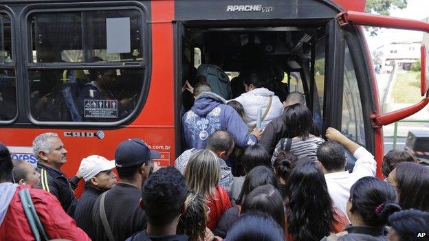 Commuters in Sao Paulo bus on strike day