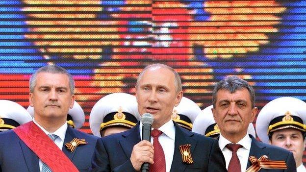 Russian President Vladimir Putin speaks during his visit to the Crimean port of Sevastopol