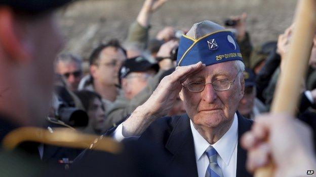 A US veteran saluted at a D-Day commemoration event