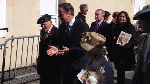 David Cameron with veterans in Bayeux