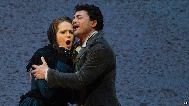 Vittorio Grigolo portrays Rodolfo with Kristine Opolais as Mimi in the Metropolitan Oper’s Live in HD broadcast of Puccini’s La Boheme, April 2014