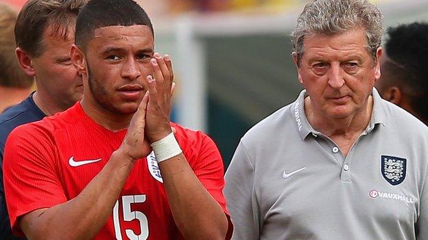 England midfielder Alex Oxlade-Chamberlain and manage Roy Hodgson