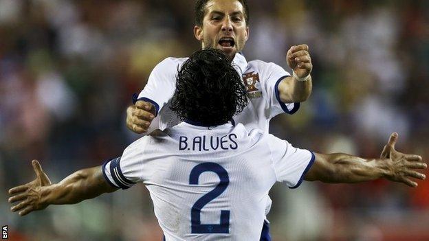 Joao Moutinho and Bruno Alves celebrate