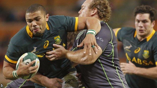 Bryan Habana is tackled