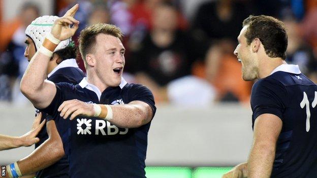 Stuart Hogg celebrates with team-mate Tim Visser in Houston