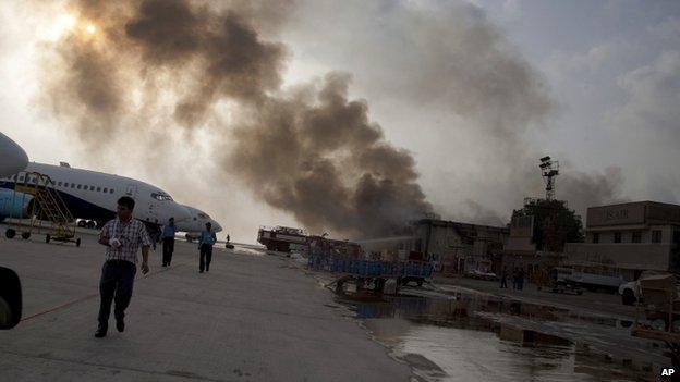 Smoke billows from Karachi airport (9 June 2014)