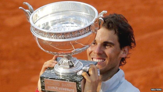 Rafael Nadal lifts the French Open trophy