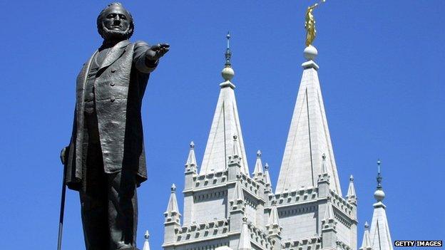 A statue of Brigham Young, an early leader of the Mormon Church, stands in front of the Mormon Temple in Salt Lake City, Utah.