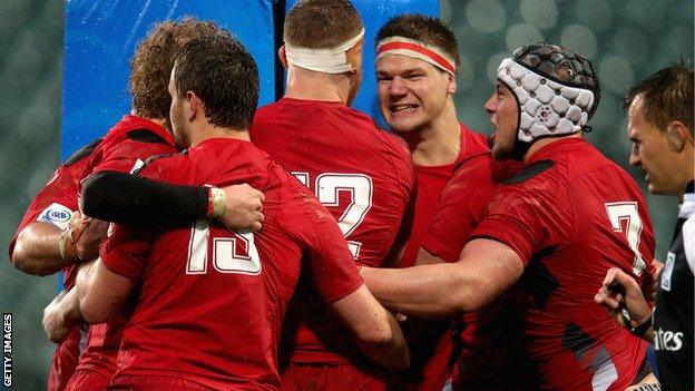 Wales celebrate after Tom Williams' try