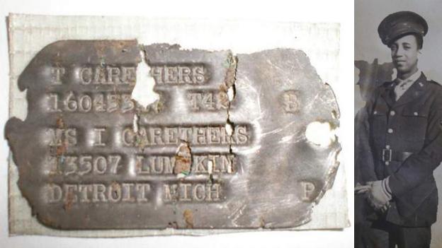 Thurmond Carethers (right) and his dog tag