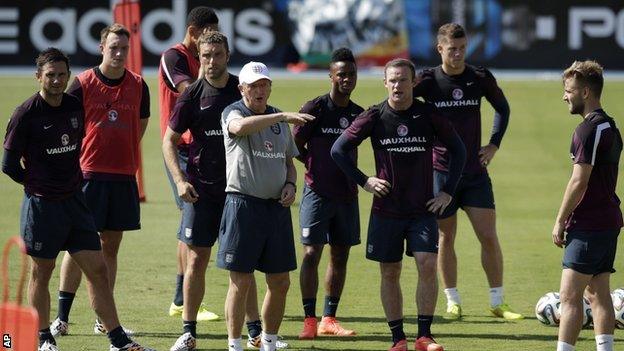 England manager Roy Hodson (second right) during training