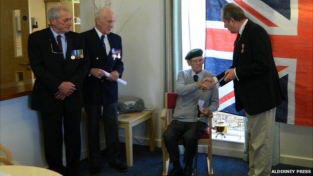 D-Day veteran George Paltridge being presented with