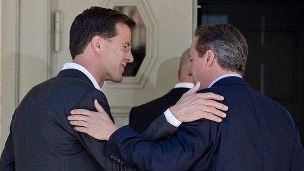 David Cameron embraces Dutch prime minister Mark Rutte after Tuesday's press conference