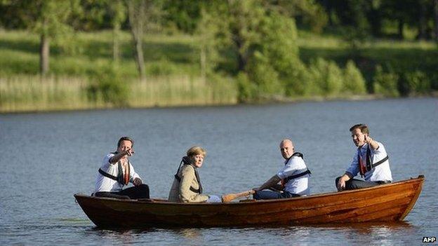 The four leaders take a trip in a rowing boat at the summer residence of Swedish prime minister Fredrik Reinfeldt