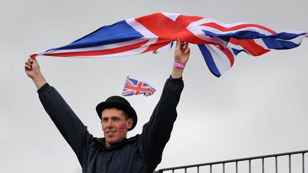 Sports spectator with abundance of Union Jacks