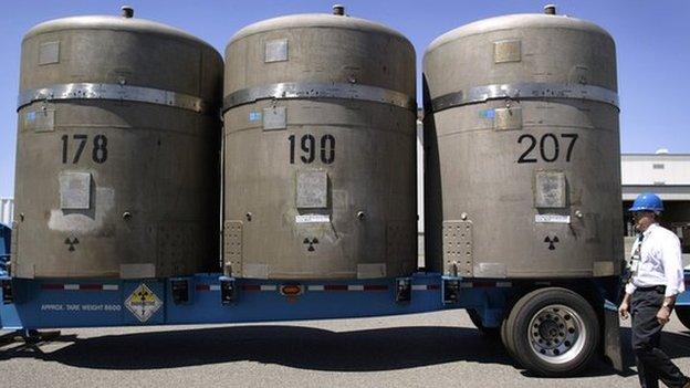 Jim Geary, facility manager at the Waste Receiving and Processing facility (WARP), looks over a shipment of three TRUPACT transport containers on the Hanford Nuclear Reservation 30 June 2005