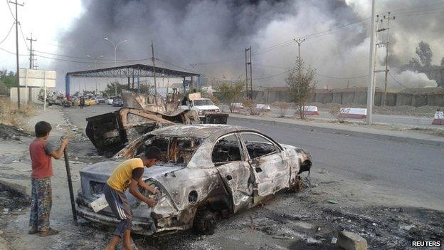 Clashes between Iraqi security forces and ISIS in Mosul. June 2014