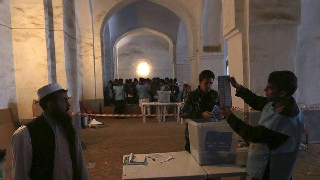 Vote counting in Herat where 100,000 ballots were invalidated in the first round