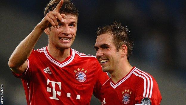 Bayern Munich's Thomas Muller and Philipp Lahm